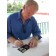 Jeremy Bulloch Signing the Exclusive 2003 Disney Star Wars Collector Nickle Silver Coin (Boba Fett Ep 4, 5, & 6 & fighter pilot in Ep 3) © Dizdollars.com